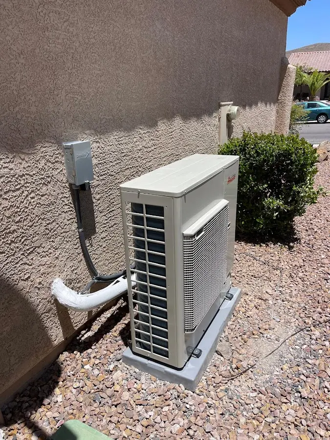 Residential air conditioning condenser unit in DeForest